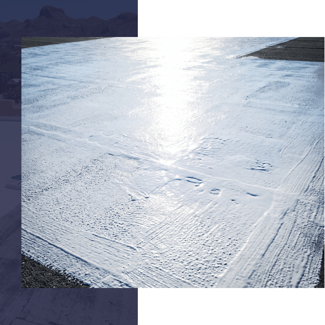 bright white, reflective roof coating freshly applied to a flat roof section, visibly reflecting the strong Arizona sunlight.